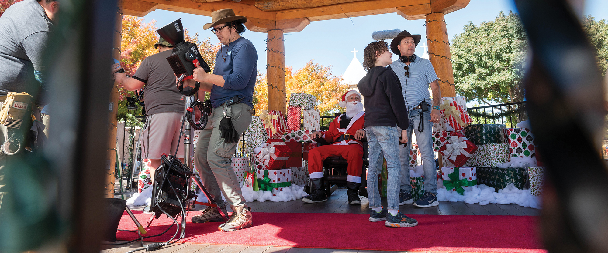 Creative Media Institute professor Ross Marks, far right, and his crew work on the feature film, “Santa’s Cousin,” starring Eric Roberts.