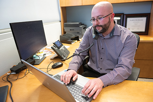 Assistant Director of Advising Technology Freddie Romero was one of the 52 volunteers who contacted students for the Calling All Aggies campaign in spring 2025. 