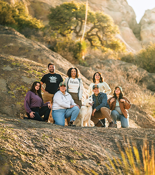 Àngel Peña, top left, and his team at Nuestra Tierra have played an instrumental role in land preservation statewide and beyond. He helped garner commu­nity support for the 2023 designation of the Castner Range National Monument in West Texas.