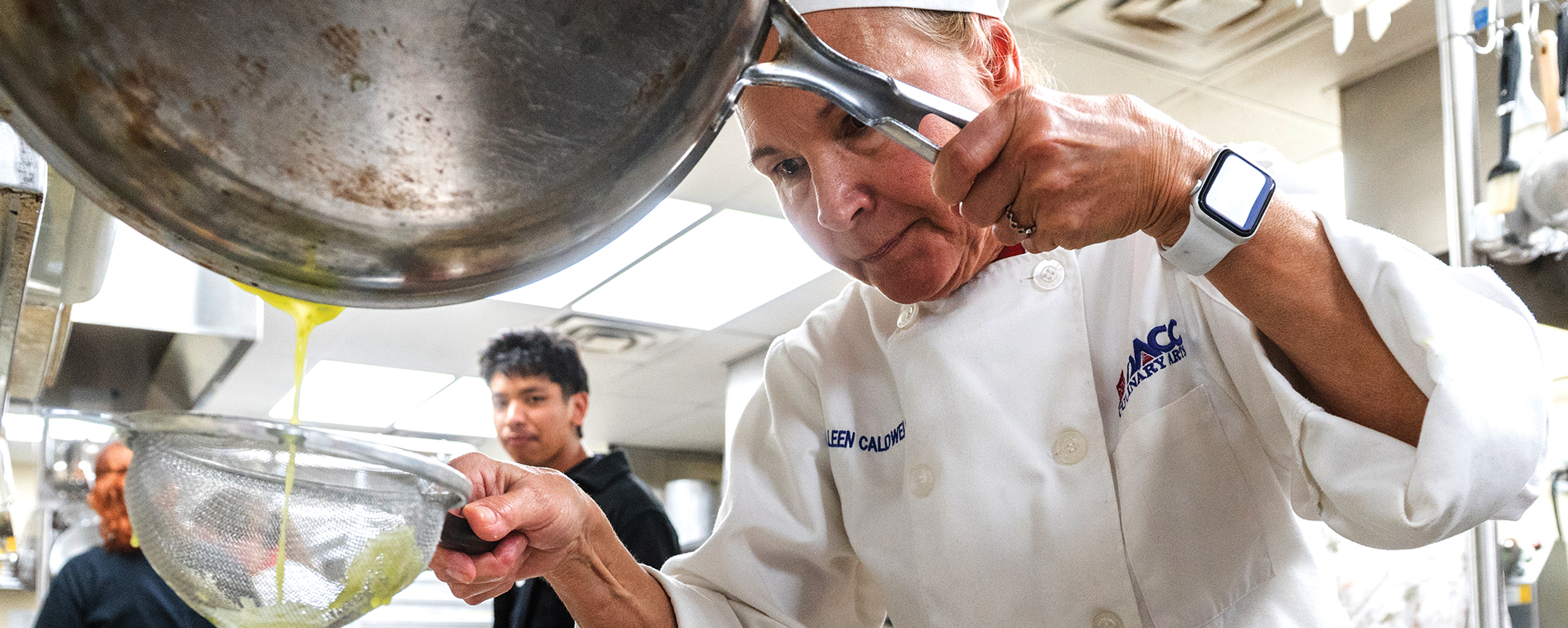Colleen Caldwell puts the finishing touches on a roasted pumpkin dish during a 575 Food Fights event in October 2024. Caldwell, a former fishery biologist, graduated from Doña Ana Community College’s culinary arts program in May 2025.