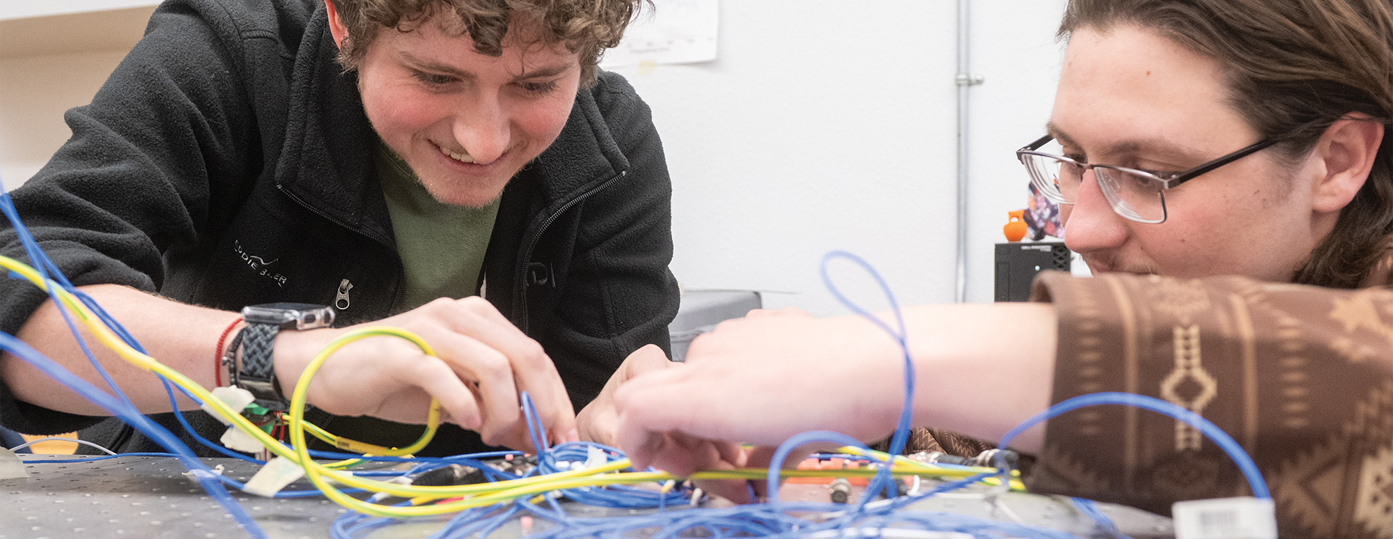 Devin Binns, left, and Sevren Jackson participated in the Physical Science Laboratory’s Classified Ready Employee Workforce program at NMSU, which began in 2020 and now boasts more than 80 graduates.