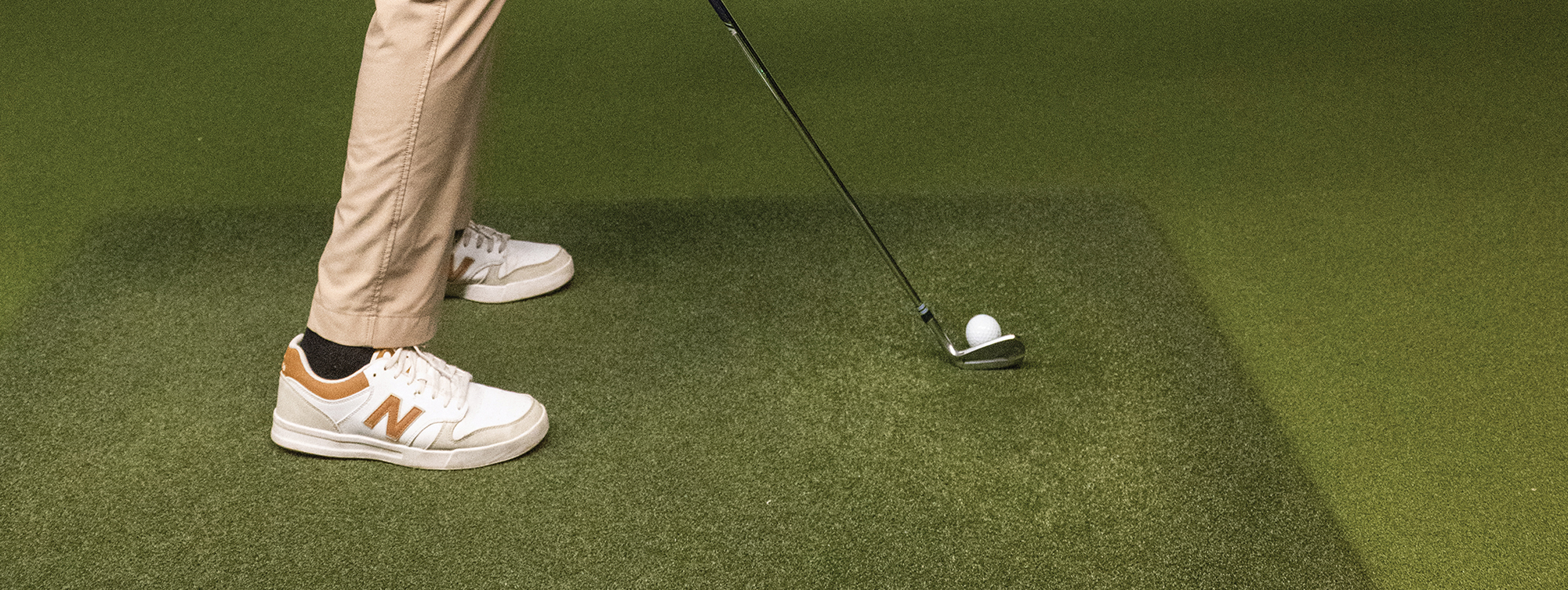 Kaden McClelen practices in NMSU’s updated Professional  Golfers’ Association Golf Management program golf lab, using  Trackman 4 technology to analyze swing data and refine performance.