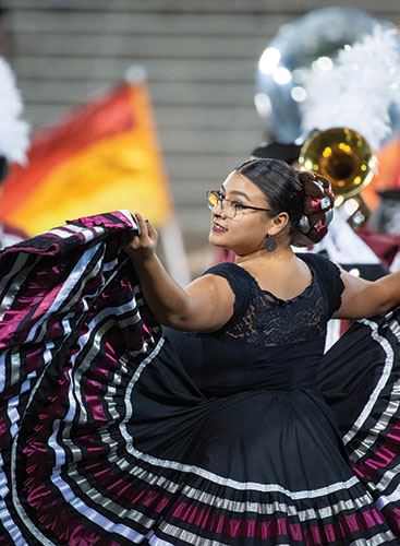 Adriana Beltran entertains an Aggie football crowd.