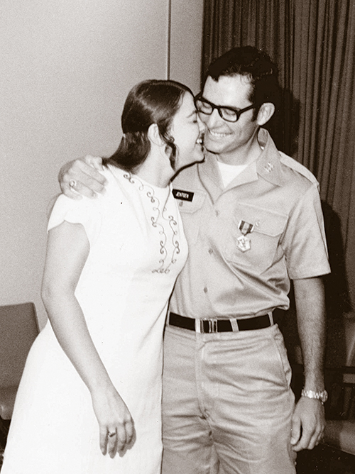 Dinah and Russ Jentgen embrace after he was awarded the Corps of Engineers Army  Commendation Medal in 1972.