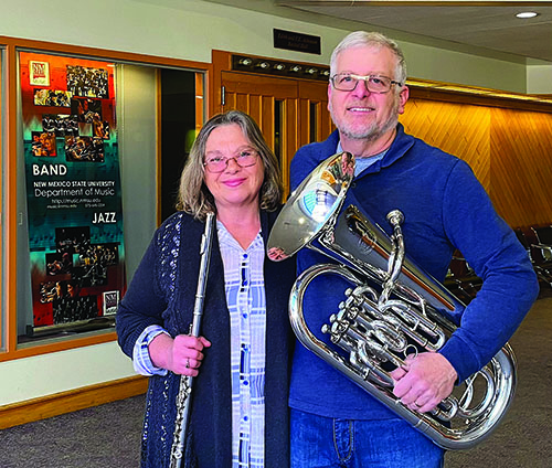 Cindy (left) and Scott McLaughlin met on a Pride Band trip. They are members of the Mesilla Valley Concert Band, which includes a large number of NMSU graduates.