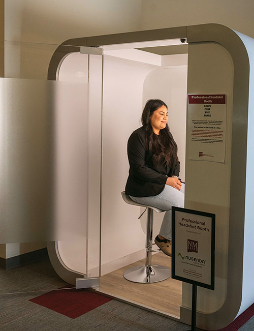 The Nusenda Professional Headshot Booth takes free photographs that can be used on social media platforms, chat and videoconference applications and email systems. NMSU students, faculty, staff and visitors to campus are able to use the booth throughout the year.