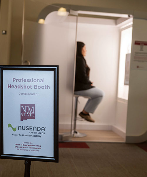 The Nusenda Professional Headshot Booth takes free photographs that can be used on social media platforms, chat and videoconference applications and email systems. NMSU students, faculty, staff and visitors to campus are able to use the booth throughout the year.